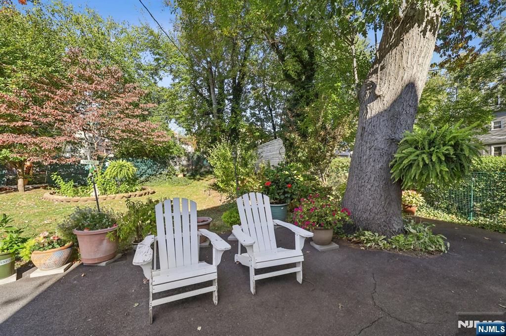 74 Forest Street, Unit 1 Montclair, NJ 07042 - Photo 19 of 23 a view of backyard with outdoor seating and plants