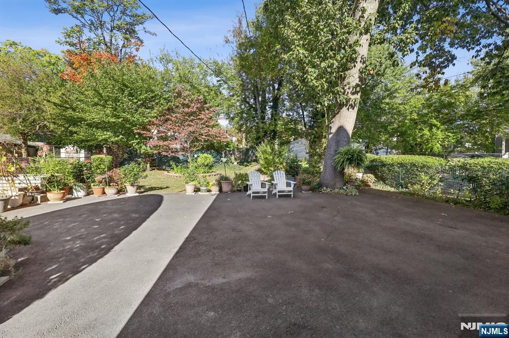 74 Forest Street, Unit 1 Montclair, NJ 07042 - Photo 22 of 23 a view of a street with some trees