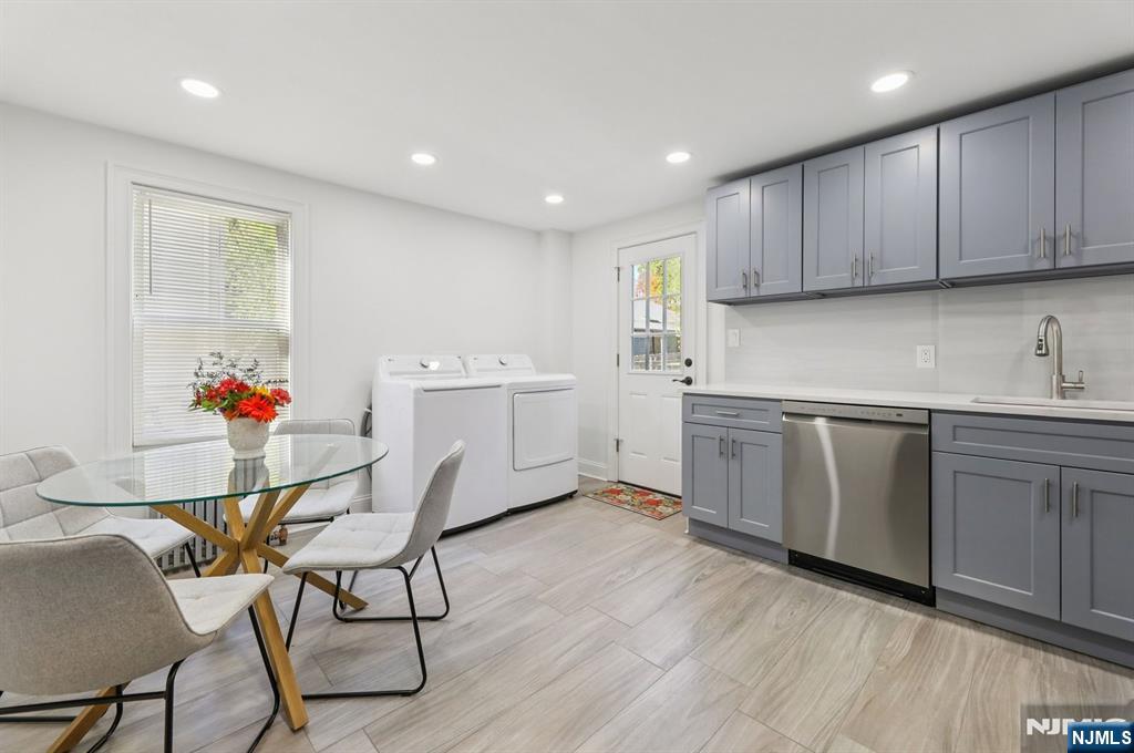 74 Forest Street, Unit 1 Montclair, NJ 07042 - Photo 3 of 23 a kitchen with a sink cabinets and wooden floor