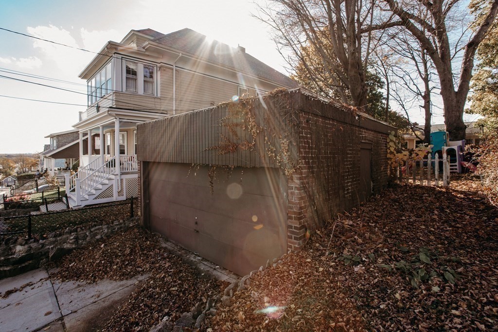 147 Train Street Boston, MA 02122 - Photo 27 of 27 a view of a house with a yard