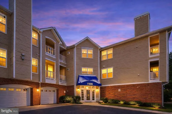 a front view of a multi story residential apartment building