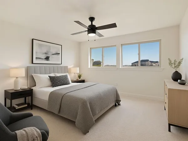 a bedroom with a bed and window
