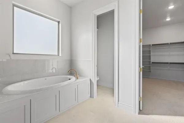 a bathroom with a sink and a bathtub