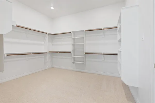 a room with walk in closet