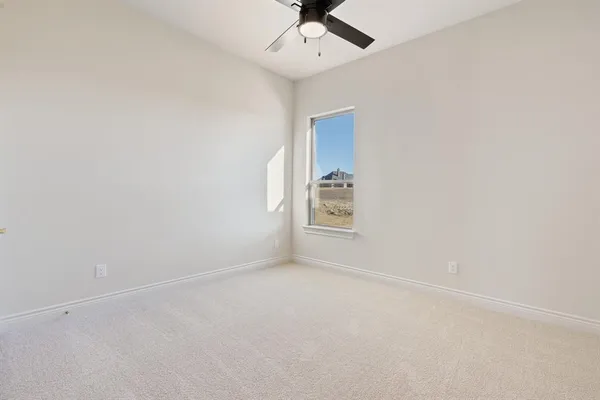 a bathroom with a sink and vanity