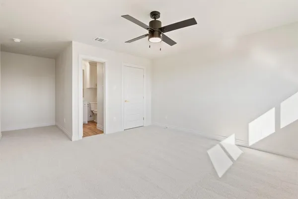 an empty room with windows and window