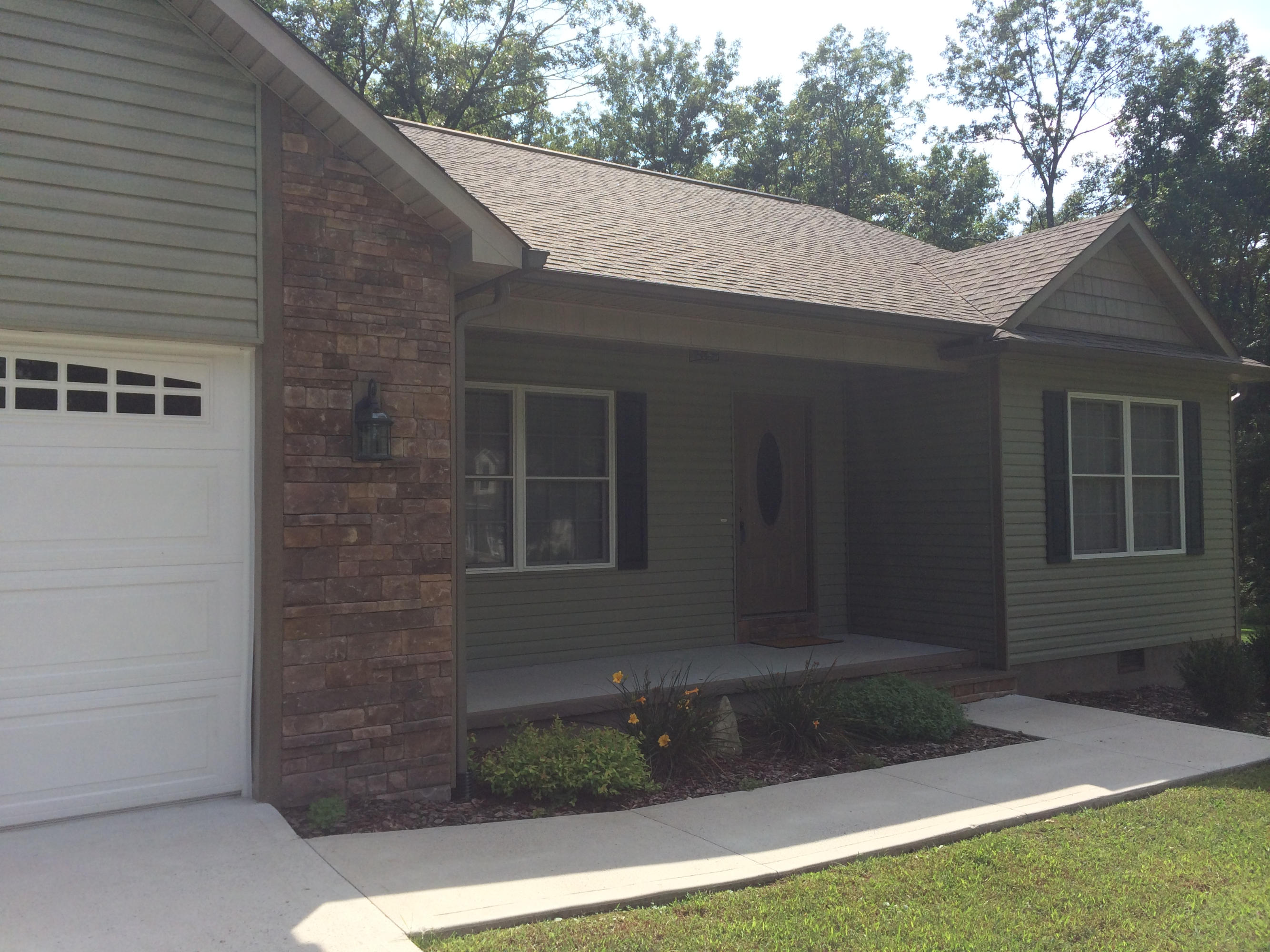 Stone and Vinyl Siding