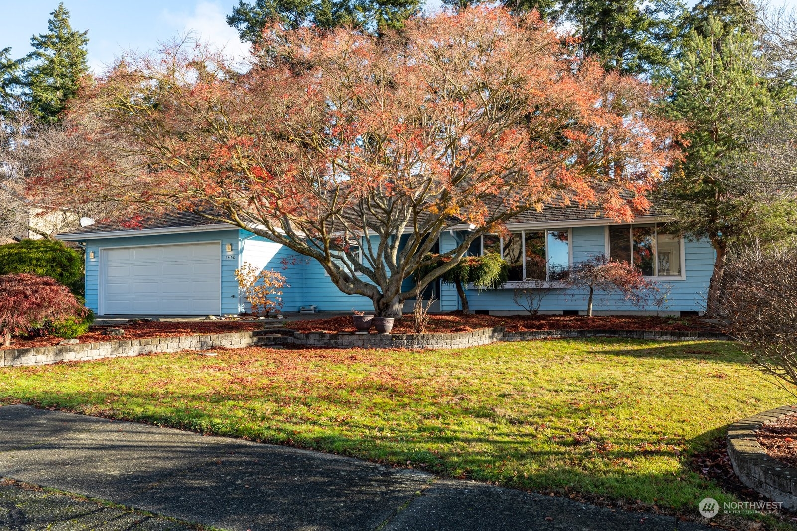 1450 Southwest Islander Lane Oak Harbor, WA 98277 - Photo 1 of 40 a view of a house with swimming pool and sitting area