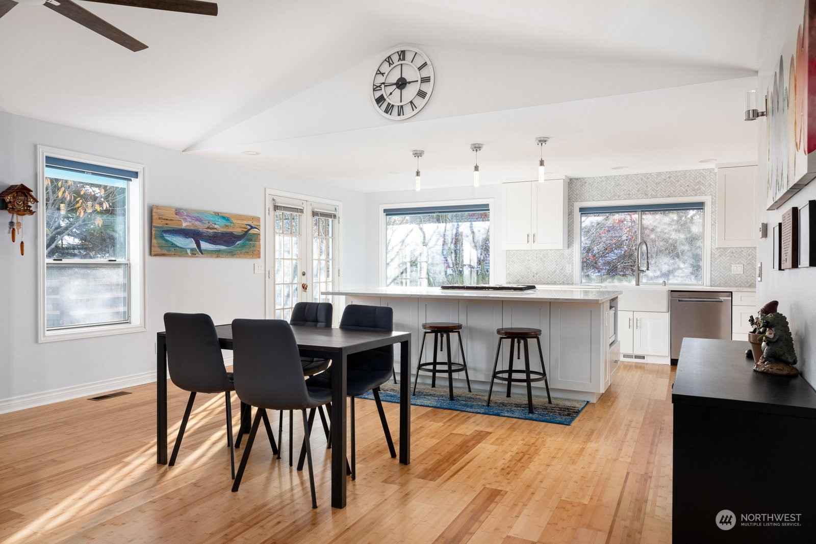 1450 Southwest Islander Lane Oak Harbor, WA 98277 - Photo 11 of 40 a view of a dining room with furniture and wooden floor