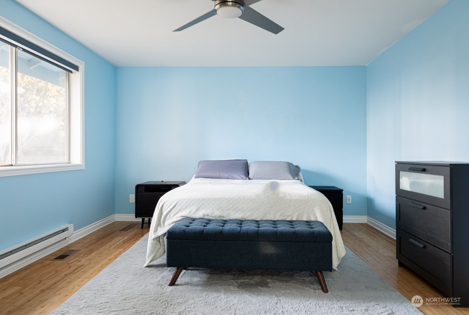 1450 Southwest Islander Lane Oak Harbor, WA 98277 - Photo 20 of 40 a bedroom with a bed and window