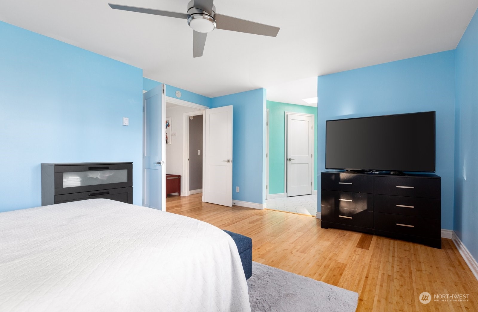 1450 Southwest Islander Lane Oak Harbor, WA 98277 - Photo 21 of 40 a bedroom with a bed and a flat screen tv
