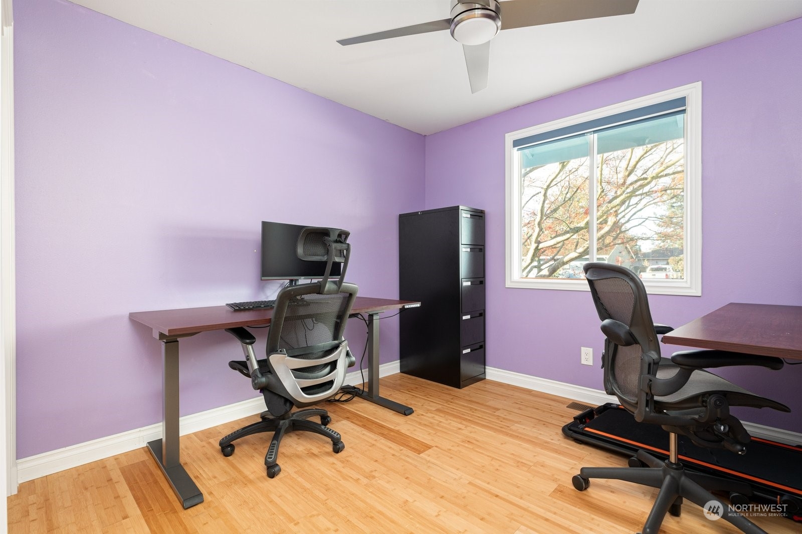 1450 Southwest Islander Lane Oak Harbor, WA 98277 - Photo 27 of 40 a work room with furniture and wooden floor