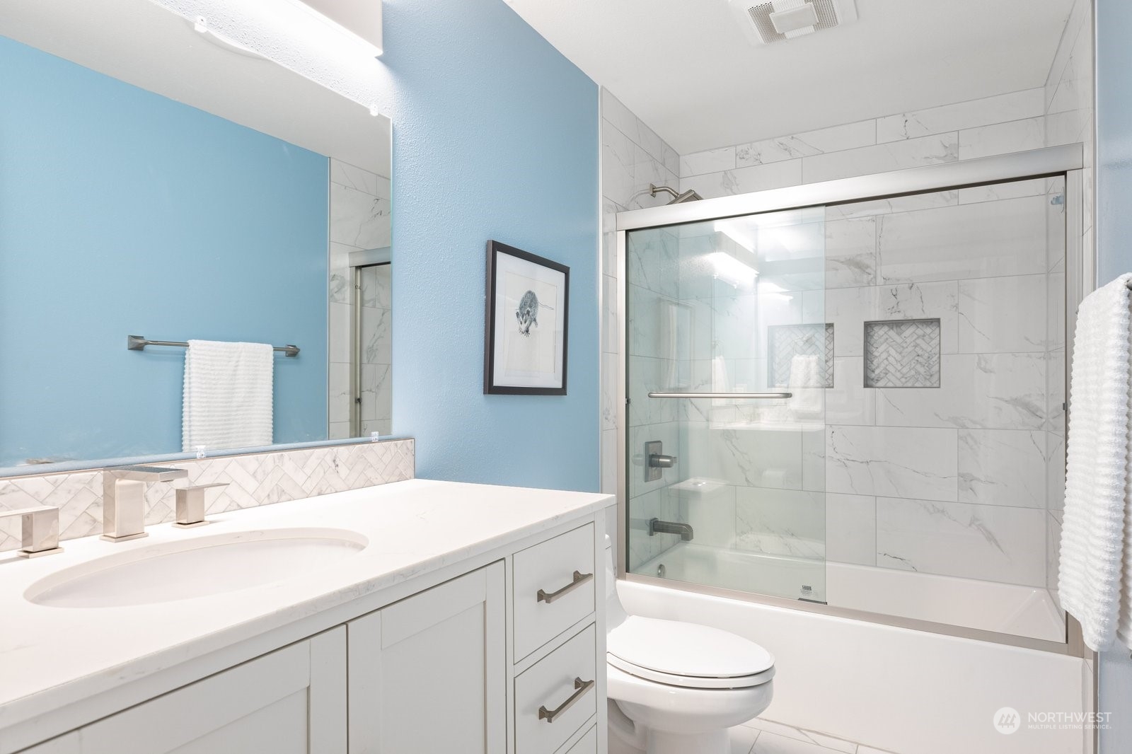 1450 Southwest Islander Lane Oak Harbor, WA 98277 - Photo 29 of 40 a bathroom with a sink a toilet and shower