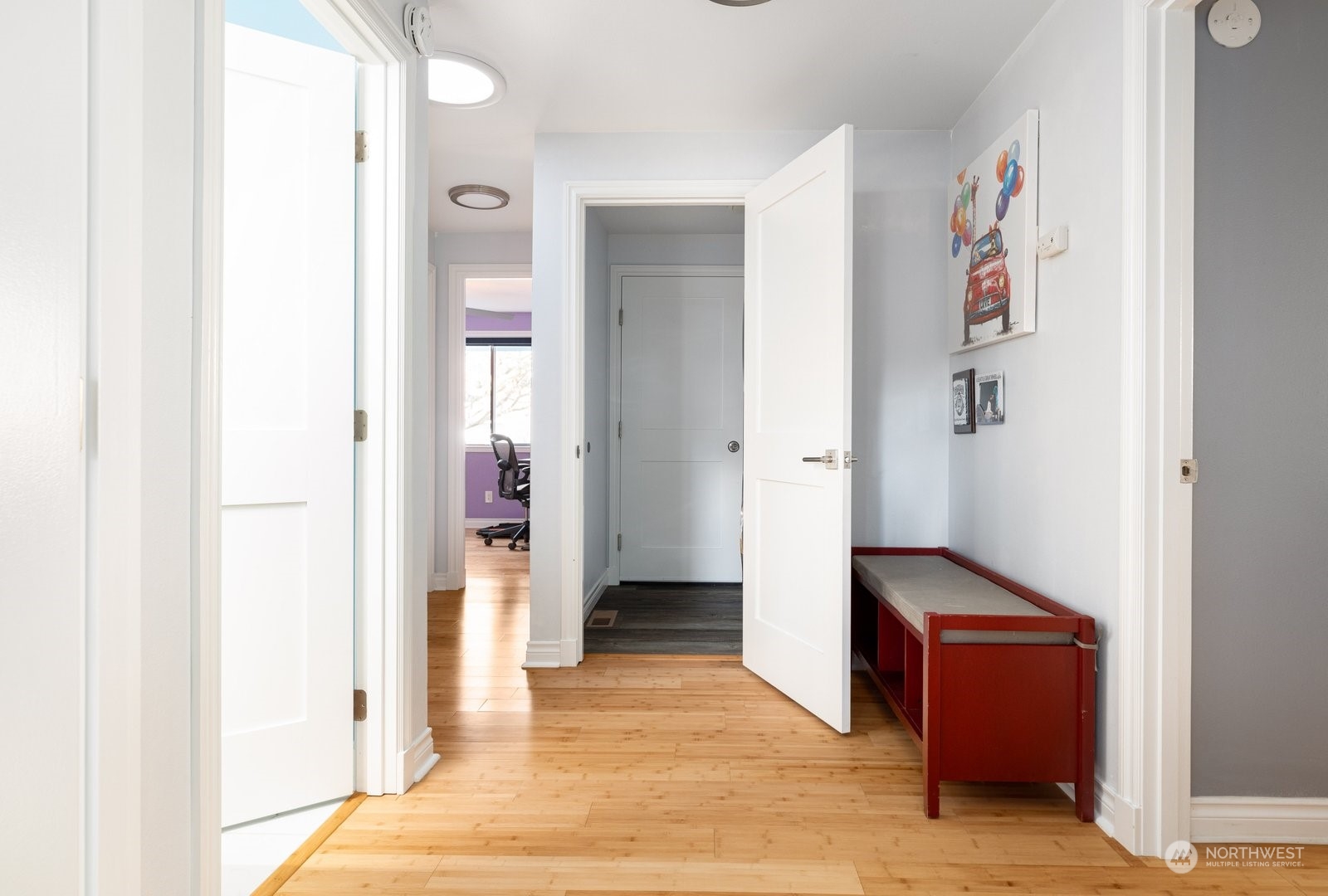 1450 Southwest Islander Lane Oak Harbor, WA 98277 - Photo 32 of 40 a view of a hallway with wooden floor and closet