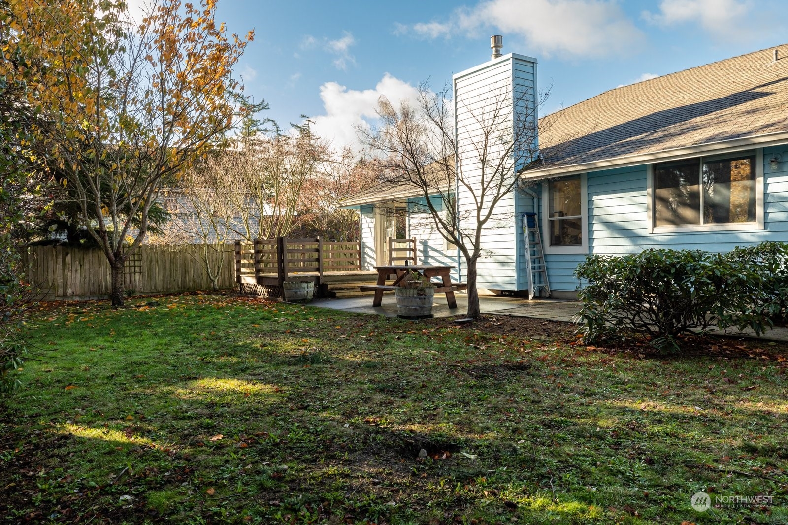 1450 Southwest Islander Lane Oak Harbor, WA 98277 - Photo 36 of 40 a view of a house with backyard and sitting area