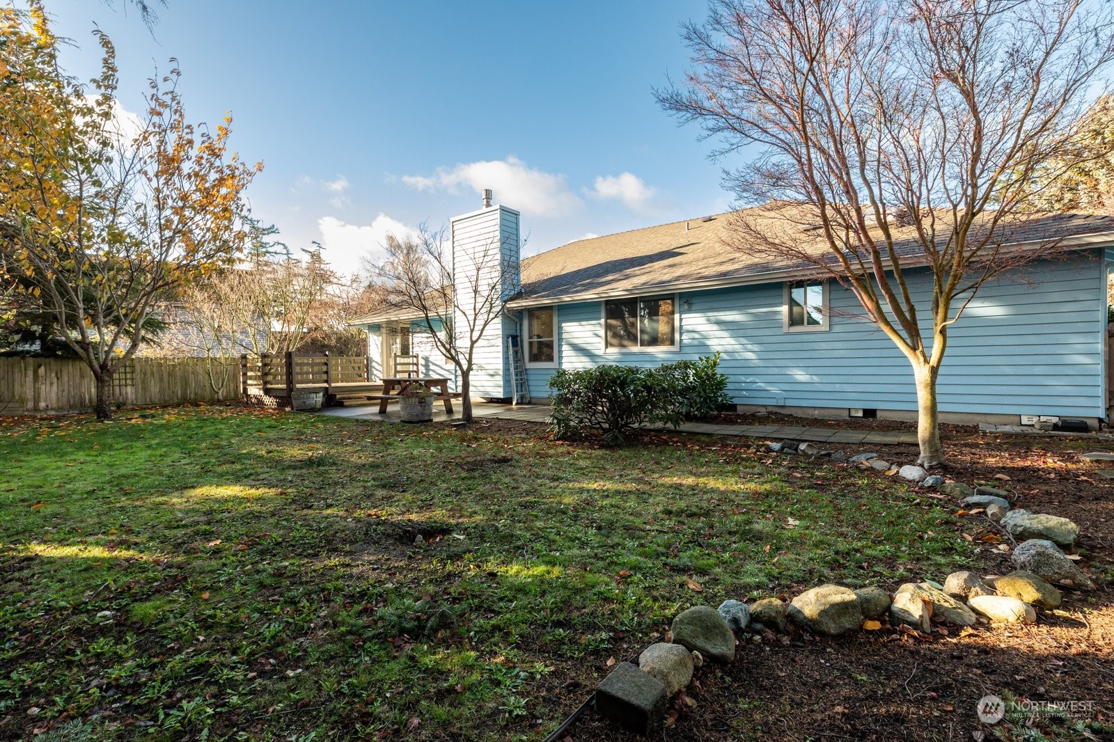 1450 Southwest Islander Lane Oak Harbor, WA 98277 - Photo 37 of 40 a view of a house with a yard
