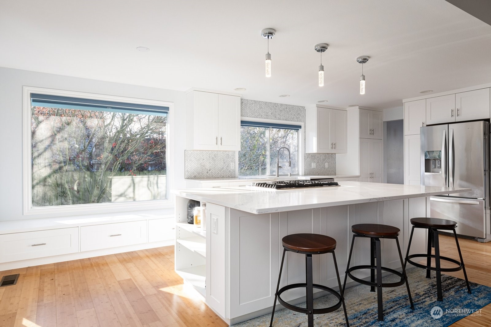 1450 Southwest Islander Lane Oak Harbor, WA 98277 - Photo 6 of 40 a kitchen with refrigerator a sink and a window