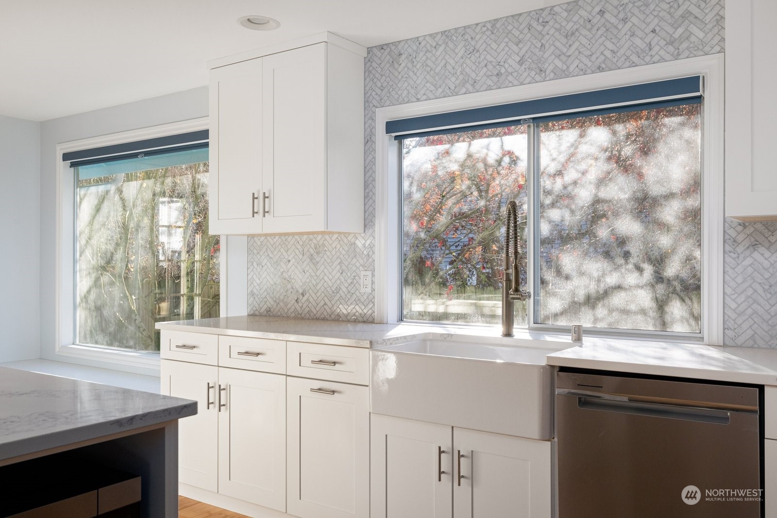 1450 Southwest Islander Lane Oak Harbor, WA 98277 - Photo 9 of 40 a kitchen with a window a sink and a counter