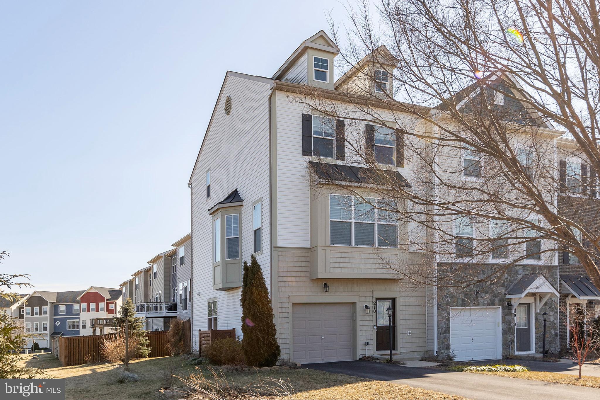 210 Flyfoot Drive Stephenson, VA 22656 - Photo 1 of 38 a front view of a building with a street