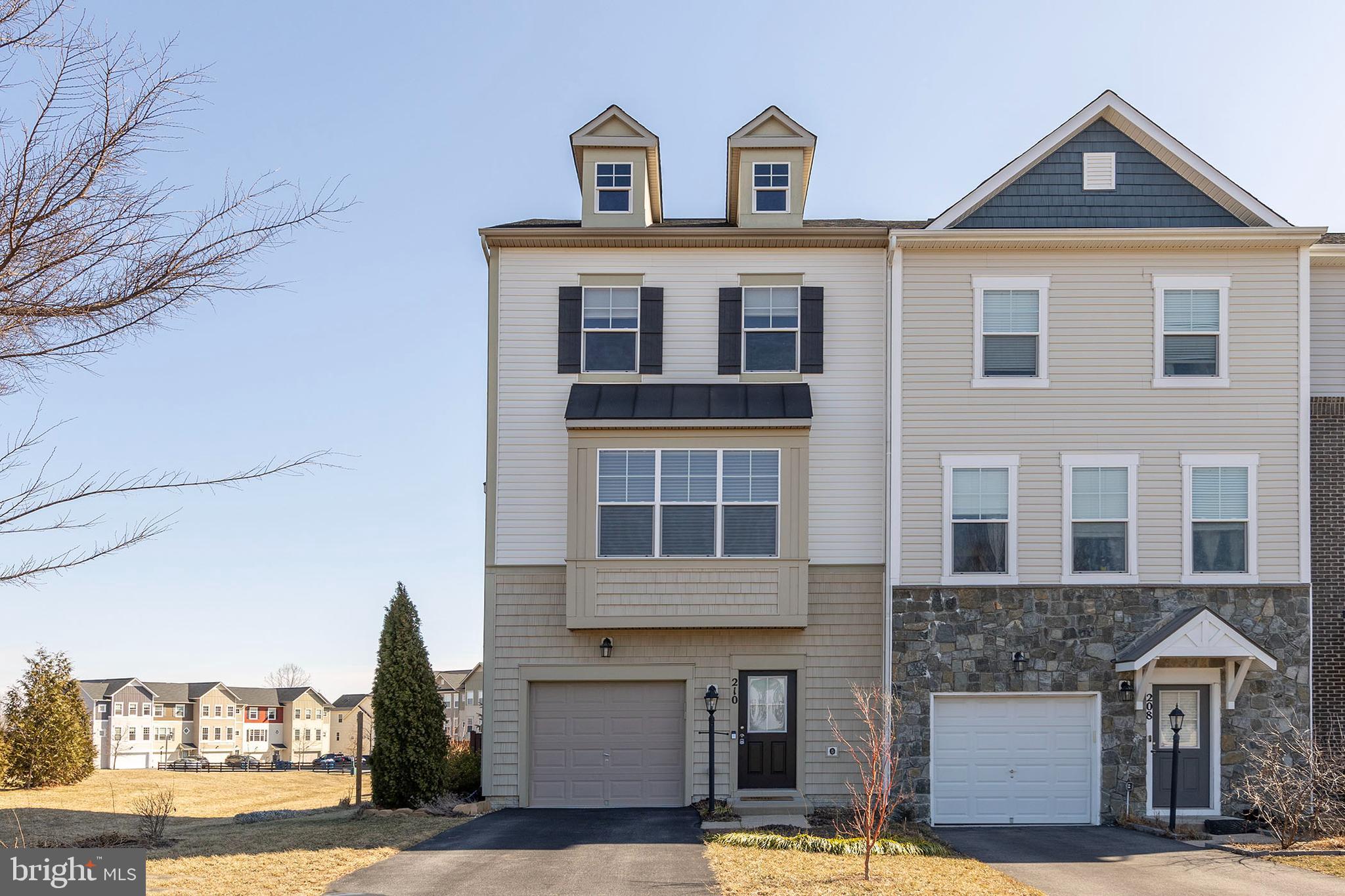 210 Flyfoot Drive Stephenson, VA 22656 - Photo 2 of 38 a front view of a house with a yard
