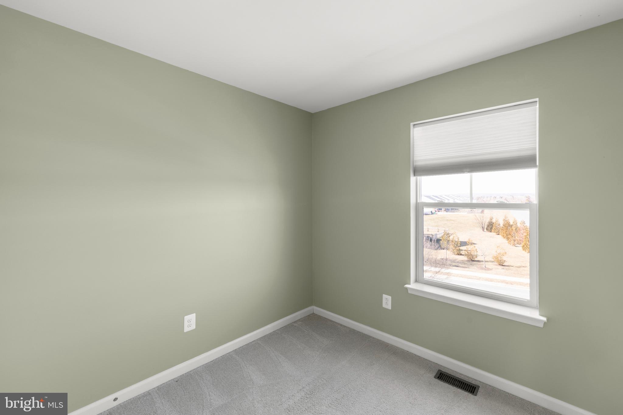 210 Flyfoot Drive Stephenson, VA 22656 - Photo 28 of 38 an empty room with windows