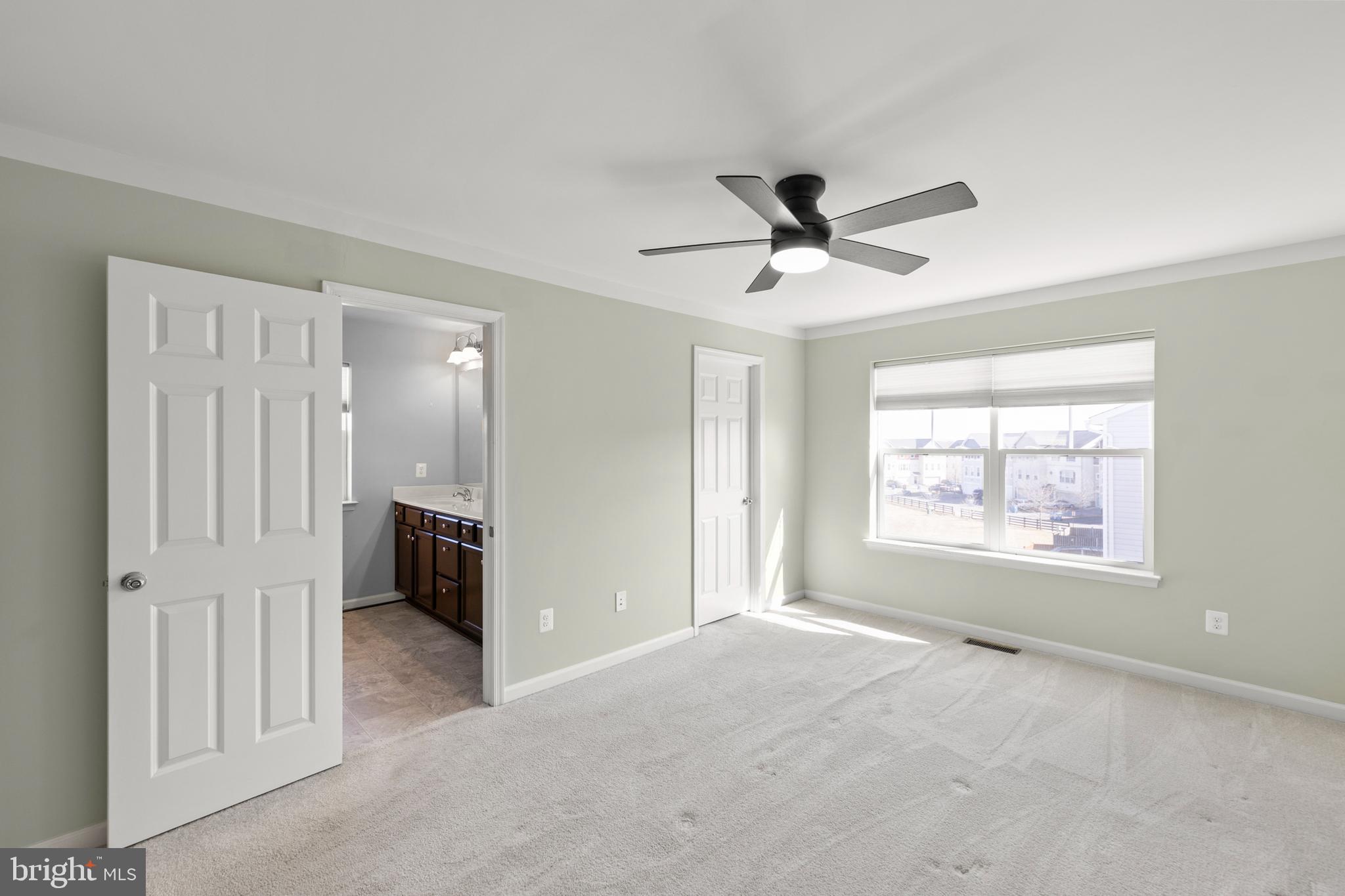 210 Flyfoot Drive Stephenson, VA 22656 - Photo 38 of 38 a view of a livingroom with a ceiling fan and window