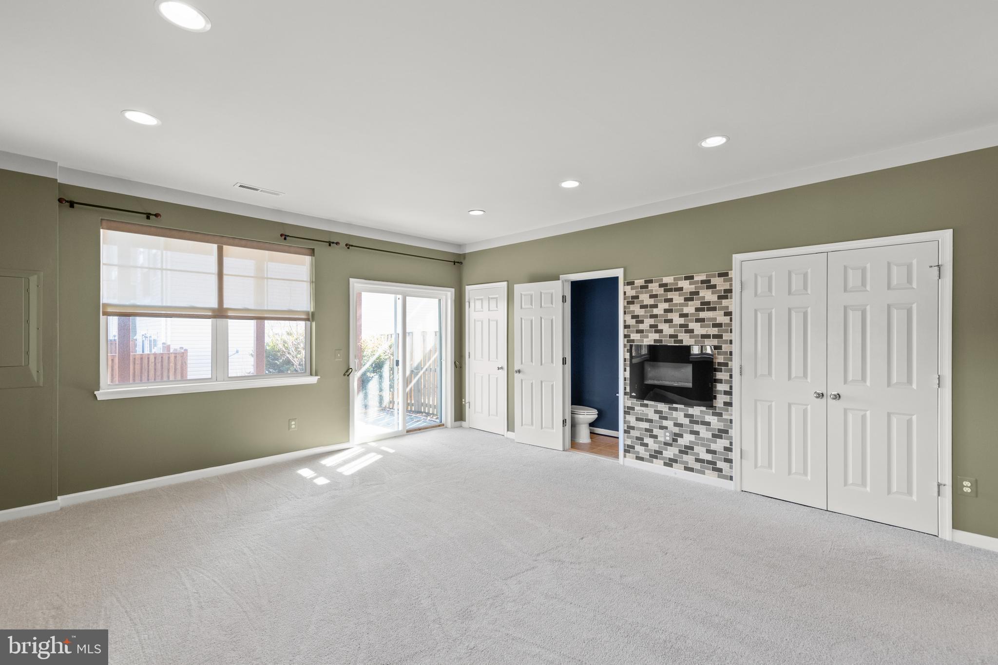 210 Flyfoot Drive Stephenson, VA 22656 - Photo 7 of 38 a view of an empty room with a window