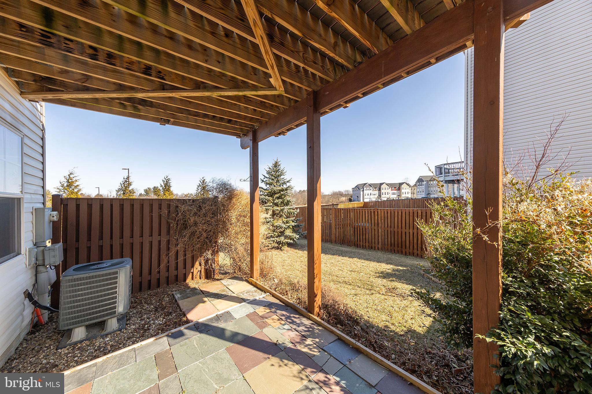 210 Flyfoot Drive Stephenson, VA 22656 - Photo 8 of 38 a view of a balcony with a floor to ceiling window next to a building