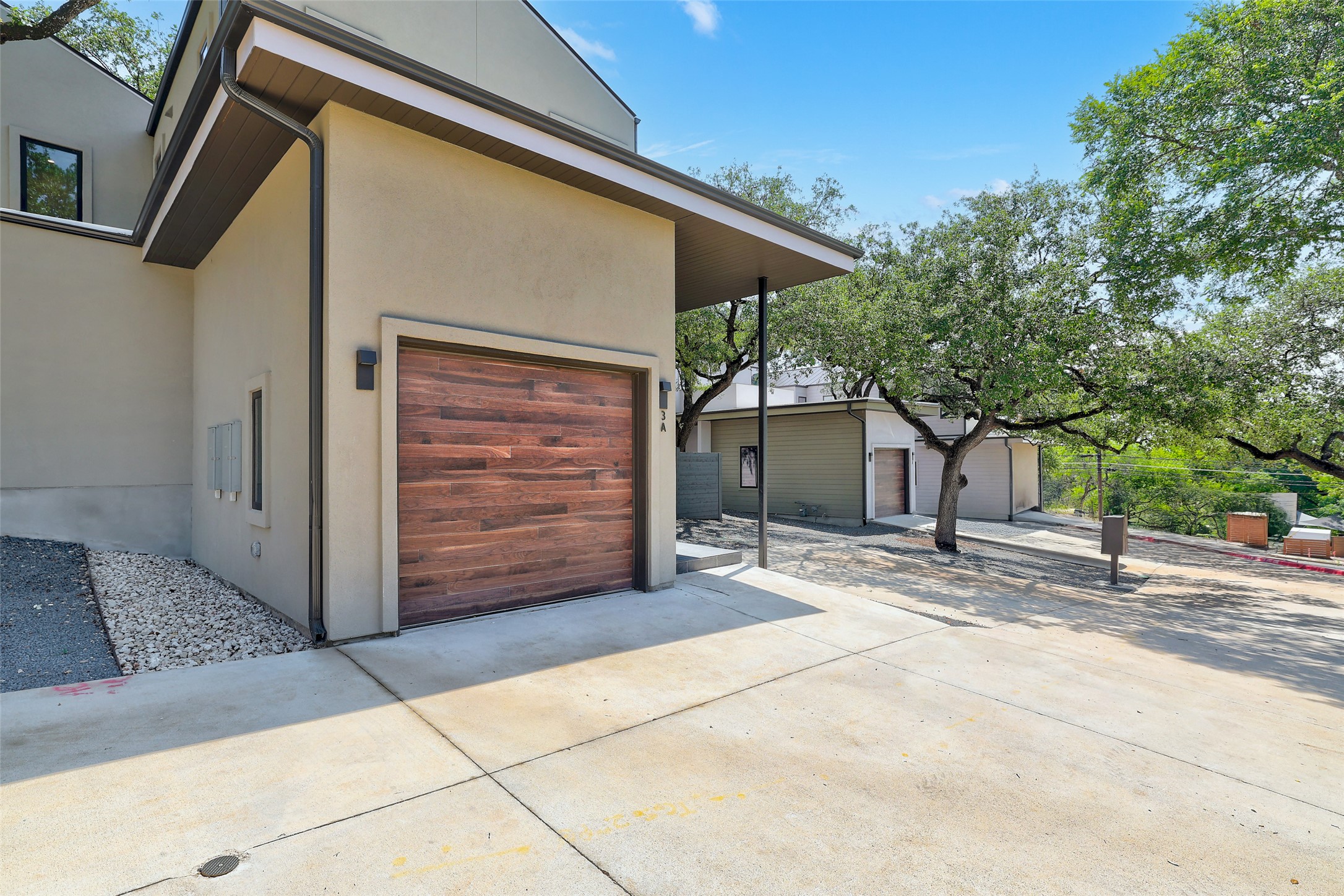 3208 Clawson Road, Unit 3A Austin, TX 78704 - Photo 1 of 1 Garage featuring concrete driveway
