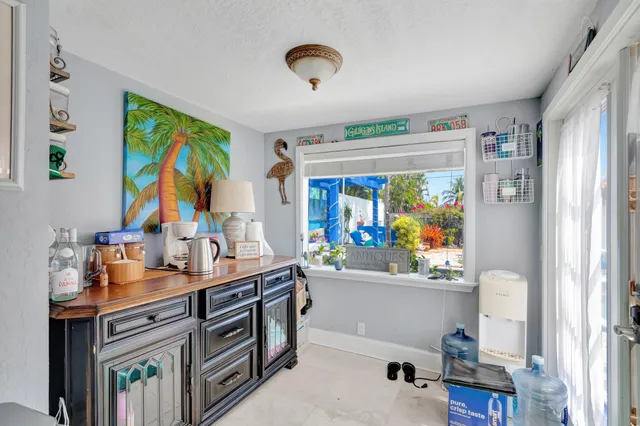 a bed room with a bed and a chair