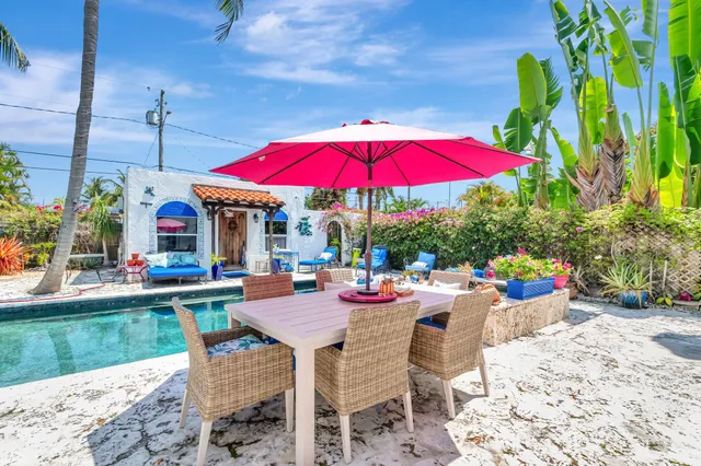 a view of store with outdoor seating