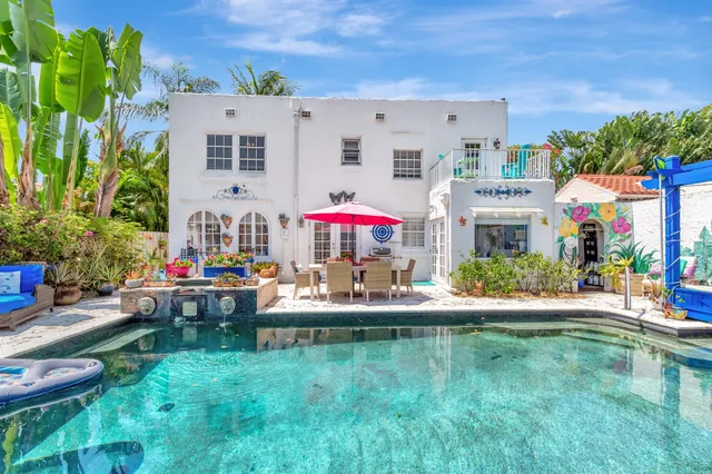 a view of swimming pool with a patio