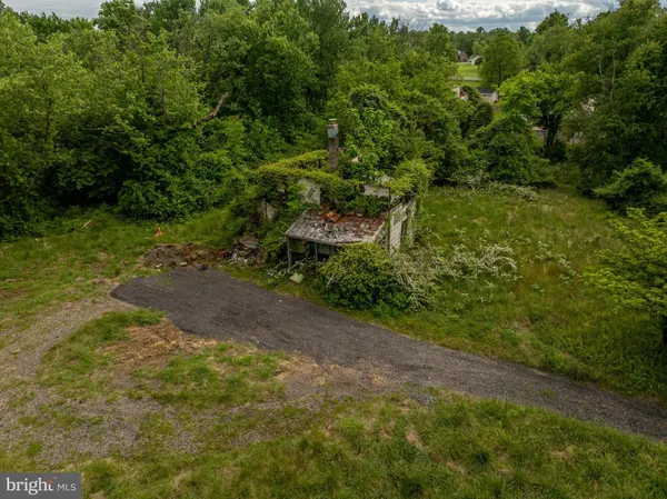 a view of a yard with an outdoor space