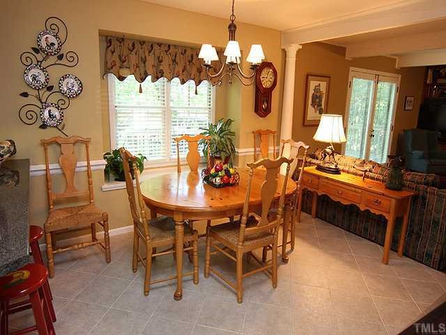 1109 Hunting Ridge Road Raleigh, NC 27615 - Photo 4 of 12 a dining room with furniture and window