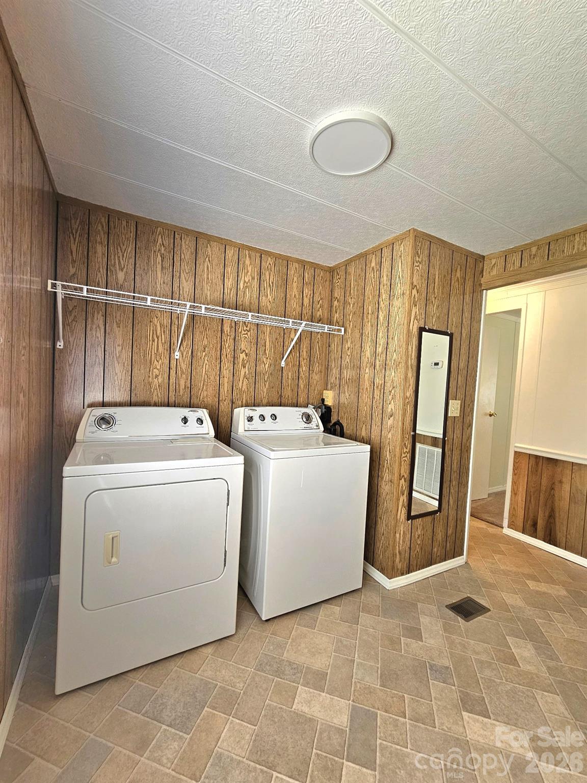 44716 Gold Branch Road Richfield, NC 28137 - Photo 16 of 47 a view of kitchen with washer and dryer