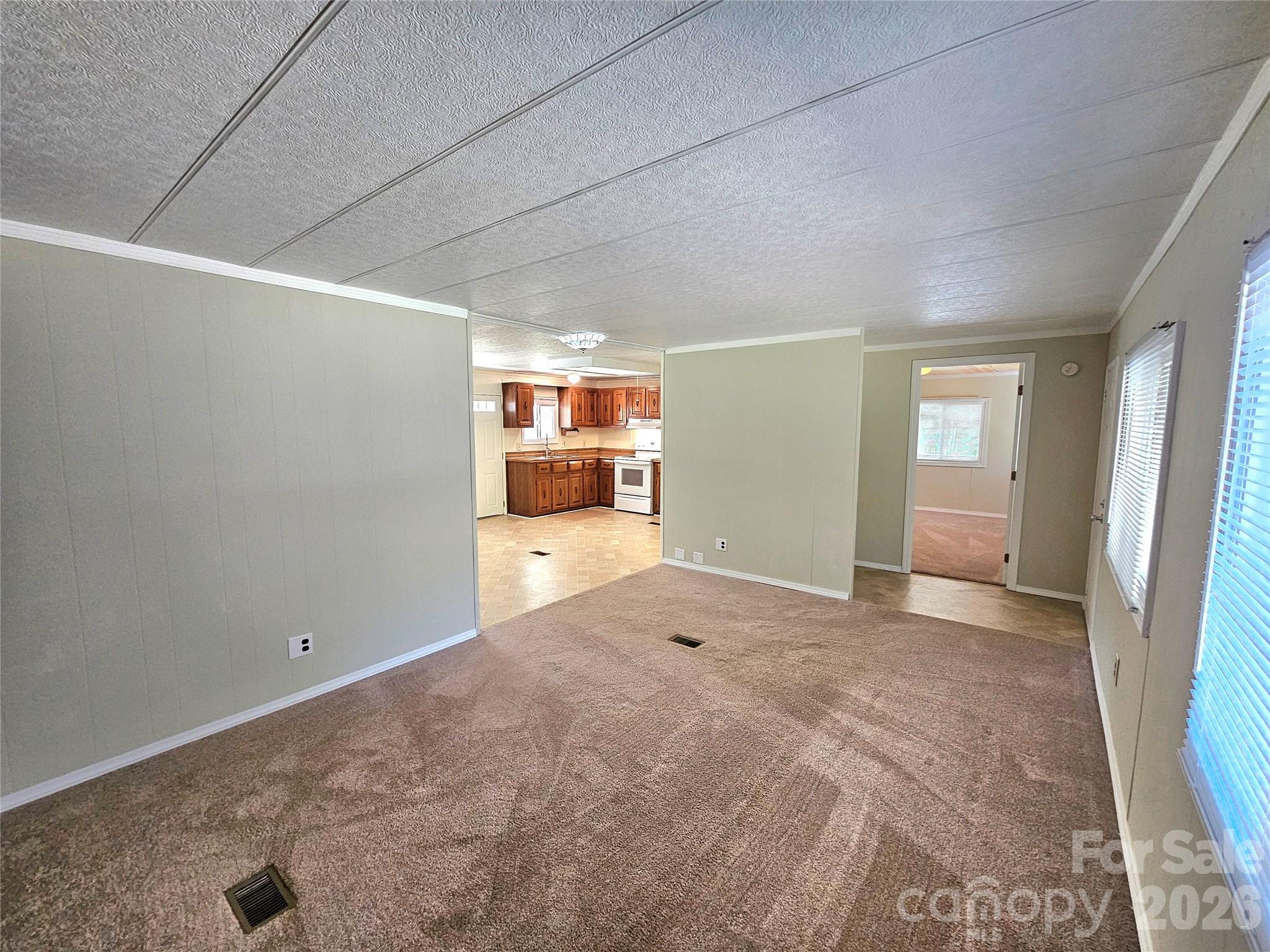 44716 Gold Branch Road Richfield, NC 28137 - Photo 23 of 47 a view of empty room with windows