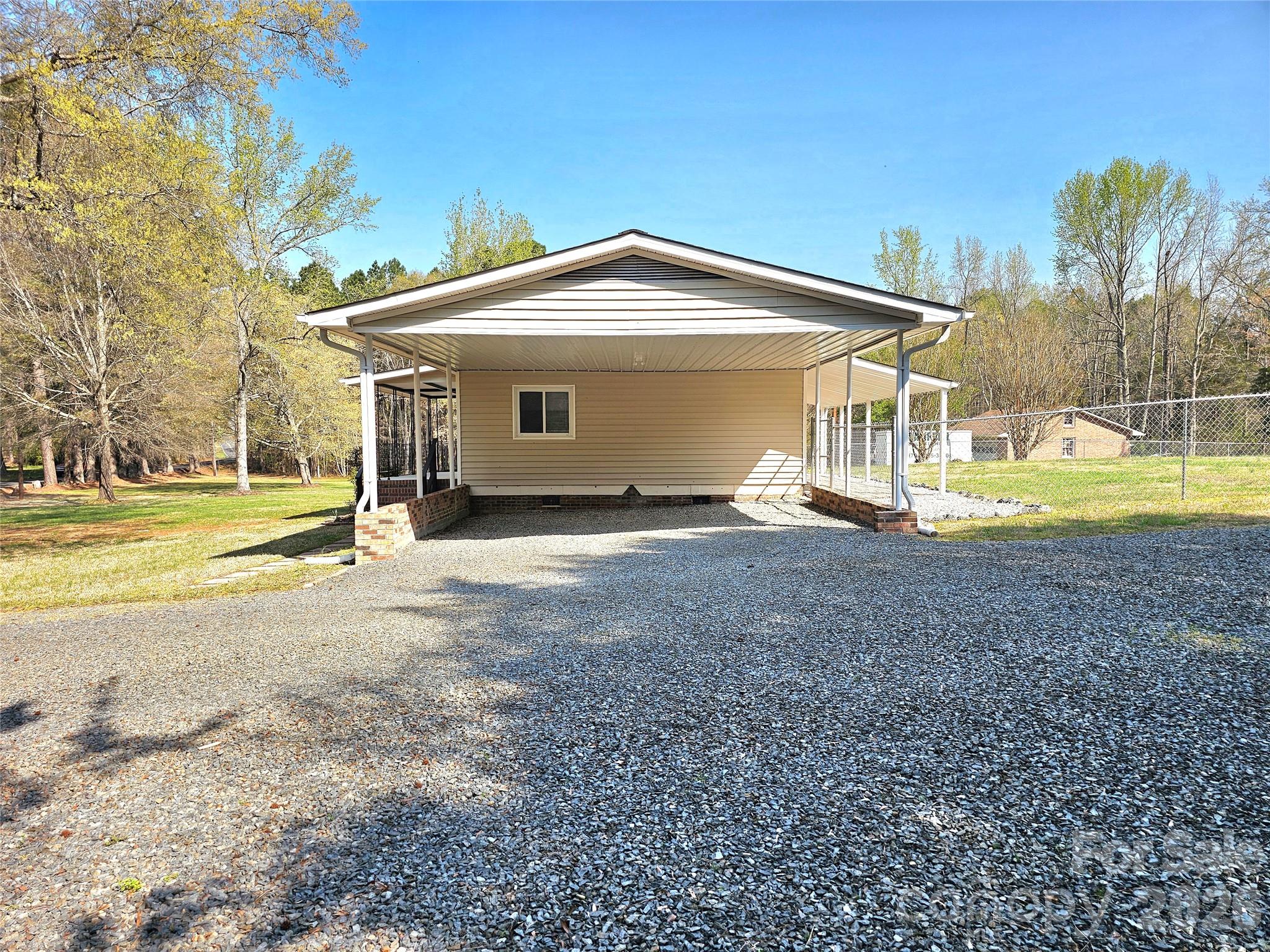 44716 Gold Branch Road Richfield, NC 28137 - Photo 4 of 47 a view of a house with a backyard