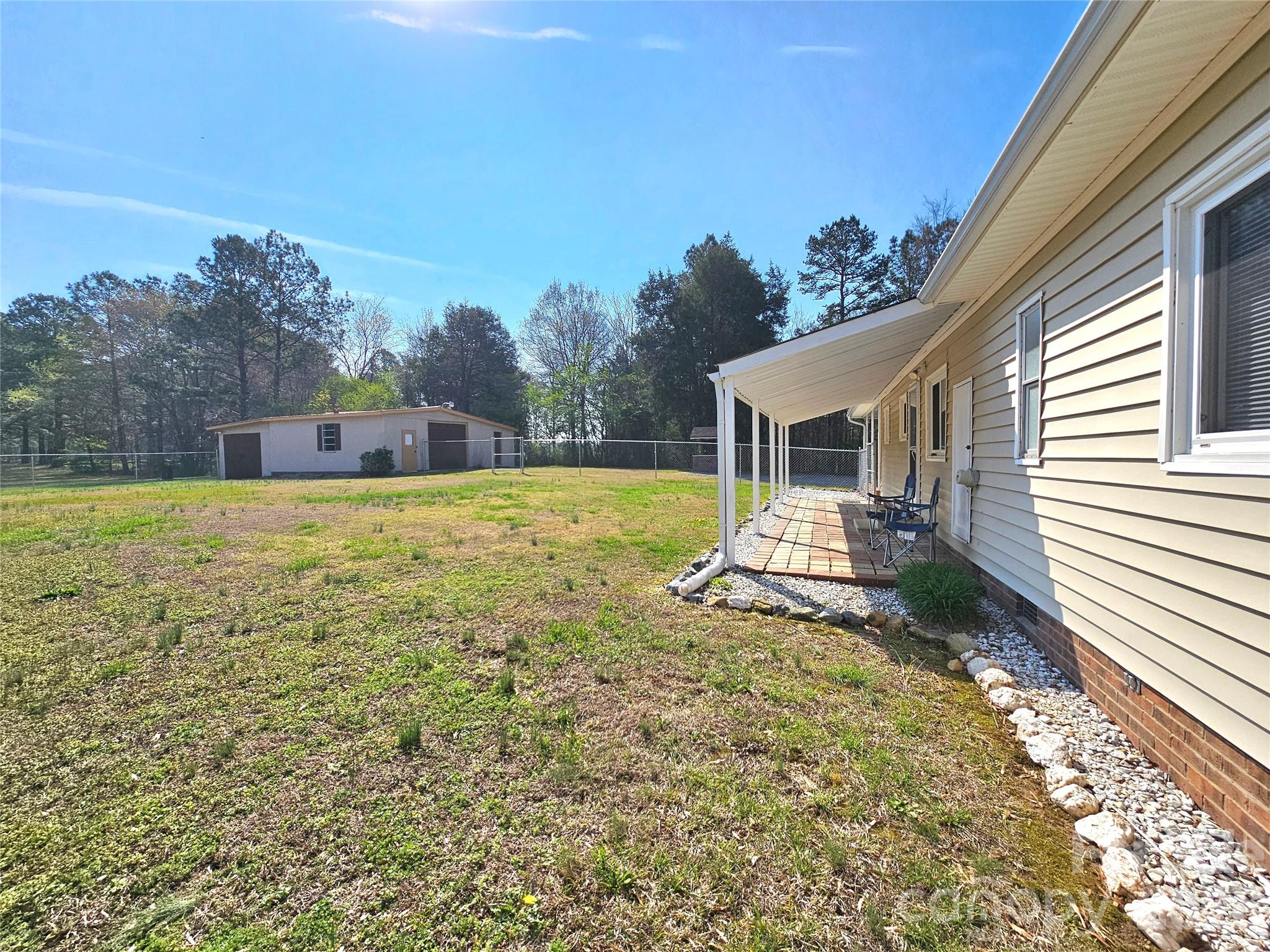44716 Gold Branch Road Richfield, NC 28137 - Photo 41 of 47 a view of a house with backyard and a tree