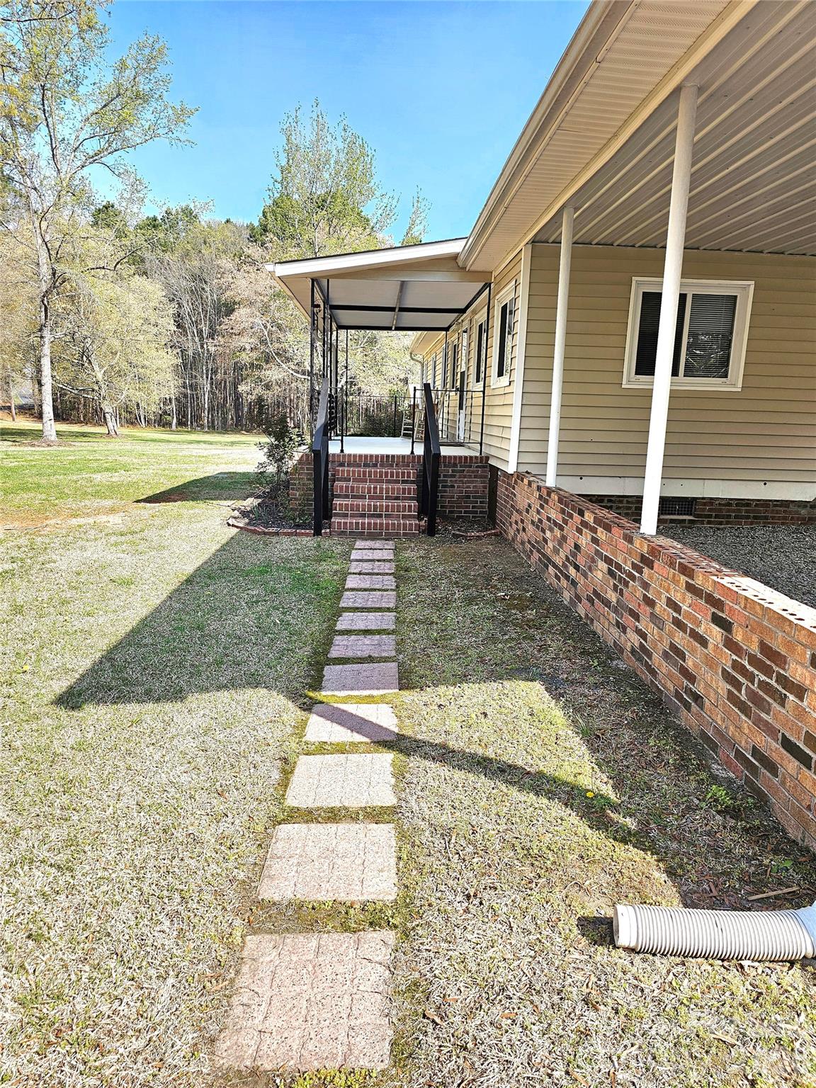 44716 Gold Branch Road Richfield, NC 28137 - Photo 6 of 47 a view of a backyard with large trees