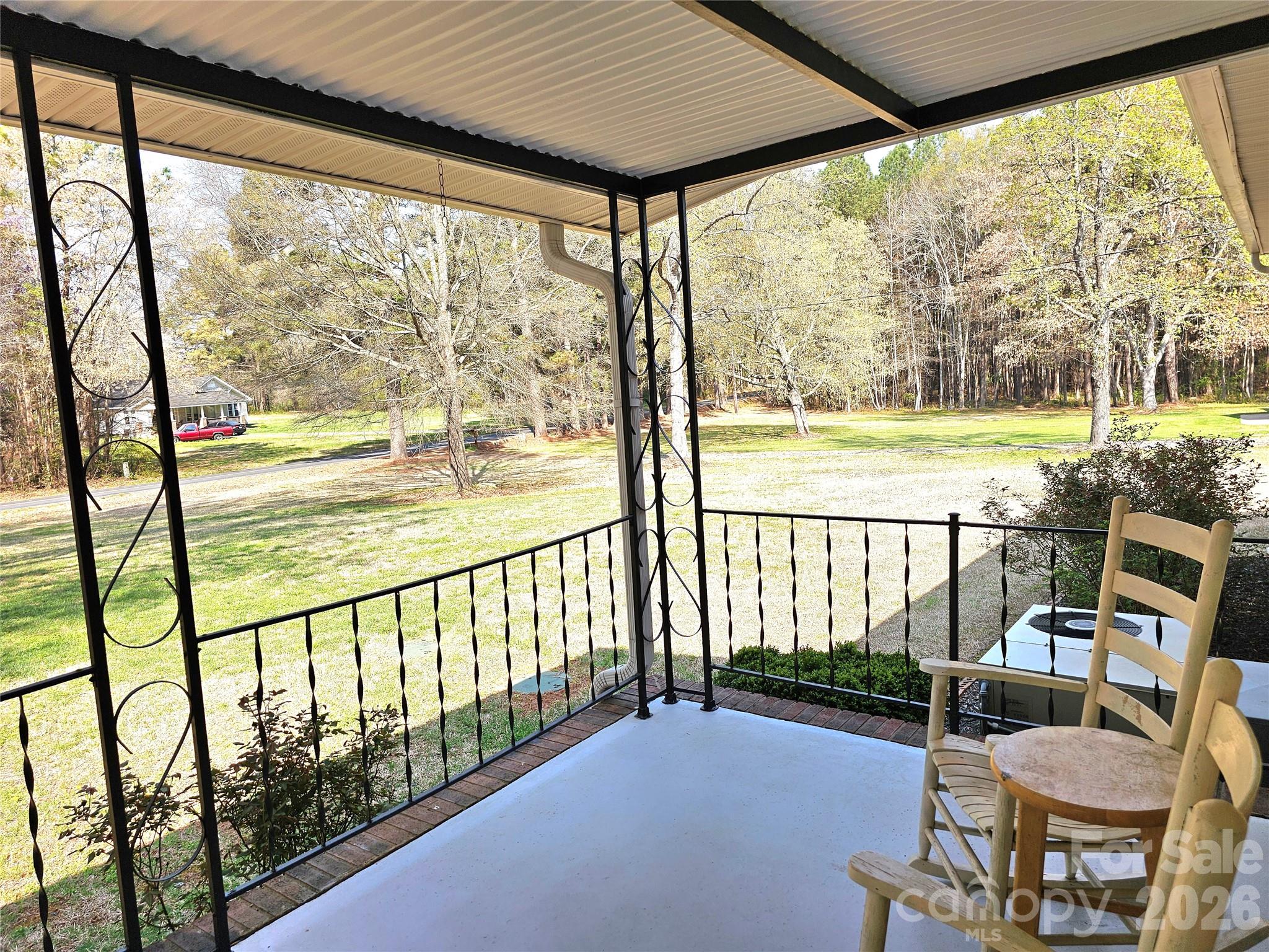 44716 Gold Branch Road Richfield, NC 28137 - Photo 9 of 47 a view of a porch with furniture and backyard