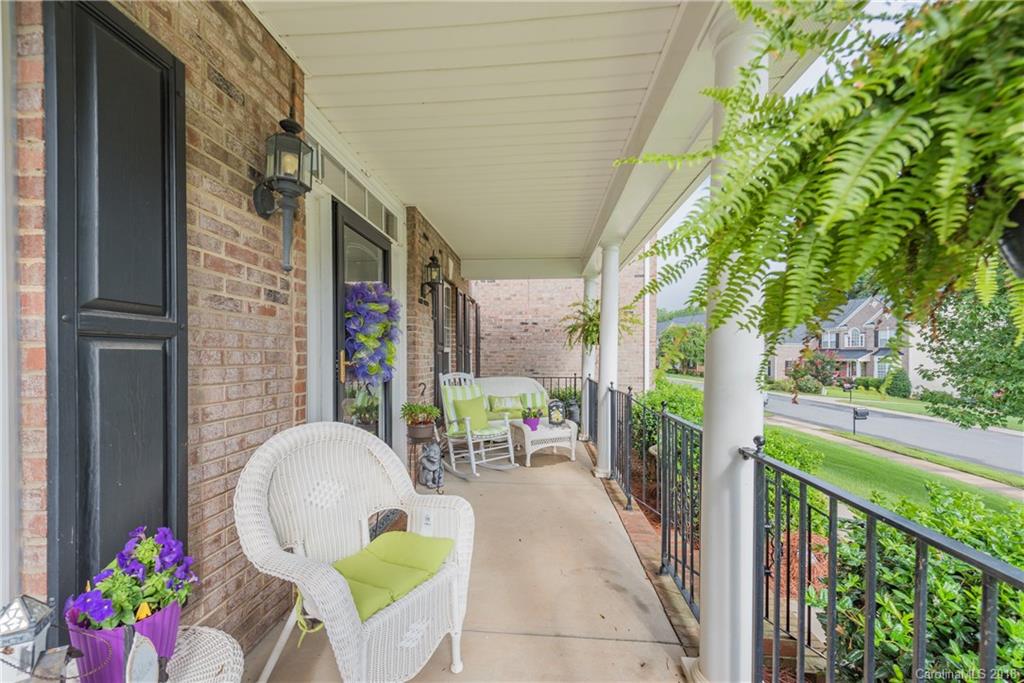 1942 Faison Avenue, Unit 161 Fort Mill, SC 29708 - Photo 2 of 21 a view of an chairs and table in the balcony