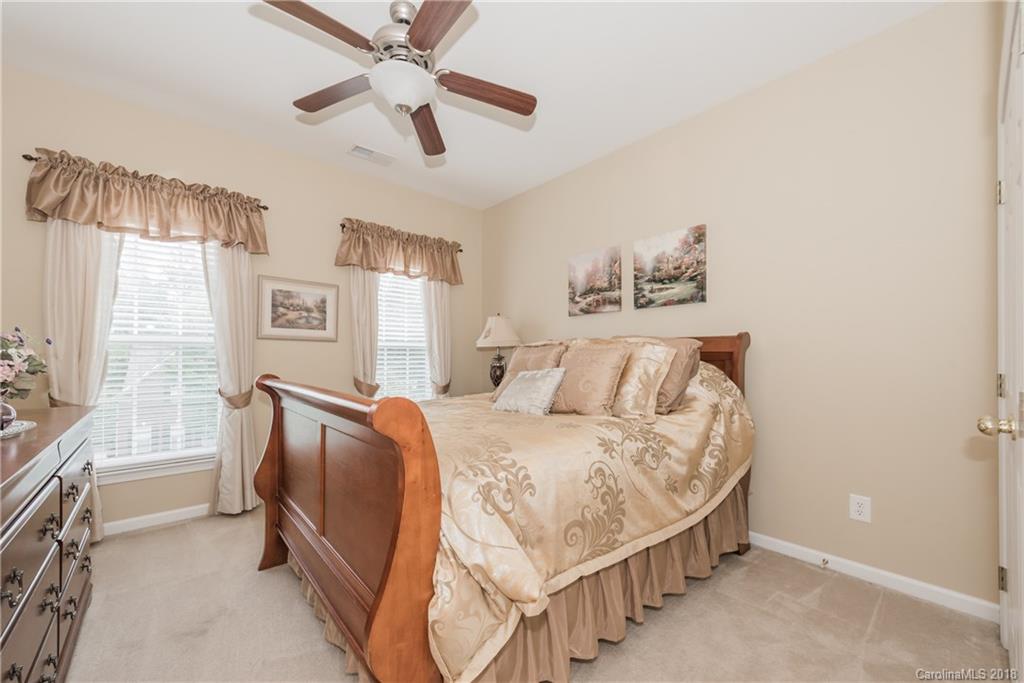 1942 Faison Avenue, Unit 161 Fort Mill, SC 29708 - Photo 14 of 21 a bedroom with a bed and a window