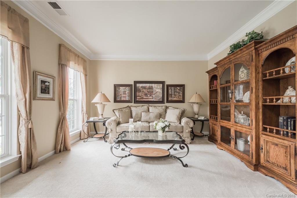 1942 Faison Avenue, Unit 161 Fort Mill, SC 29708 - Photo 3 of 21 a living room with furniture and a book shelf