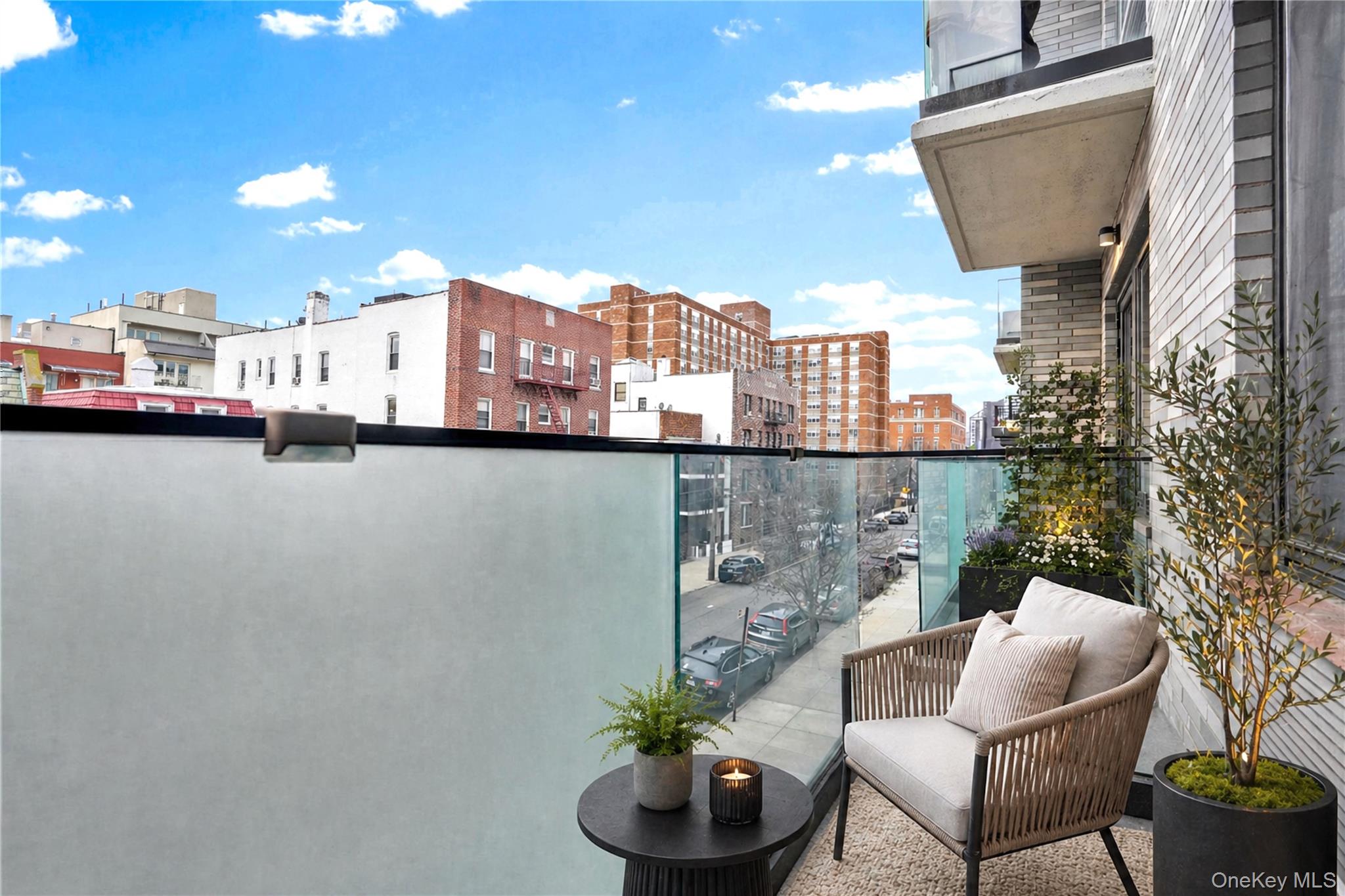 23-43 31st Road, Unit 3B Queens, NY 11106 - Photo 6 of 15 a view of a terrace with furniture and a potted plant