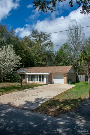a view of a house with a big yard
