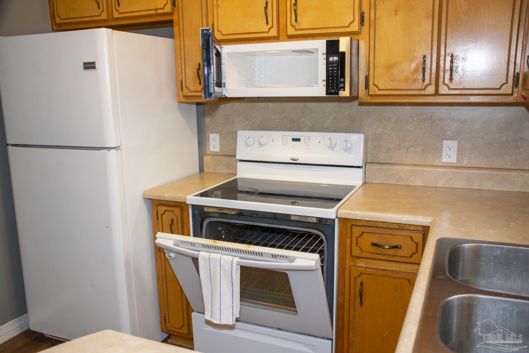 6514 Oakcrest Road Milton, FL 32570 - Photo 33 of 68 a view of washer and dryer