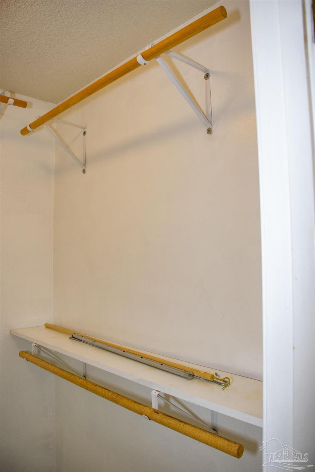 6514 Oakcrest Road Milton, FL 32570 - Photo 51 of 68 a bathroom with a bathtub and a shower