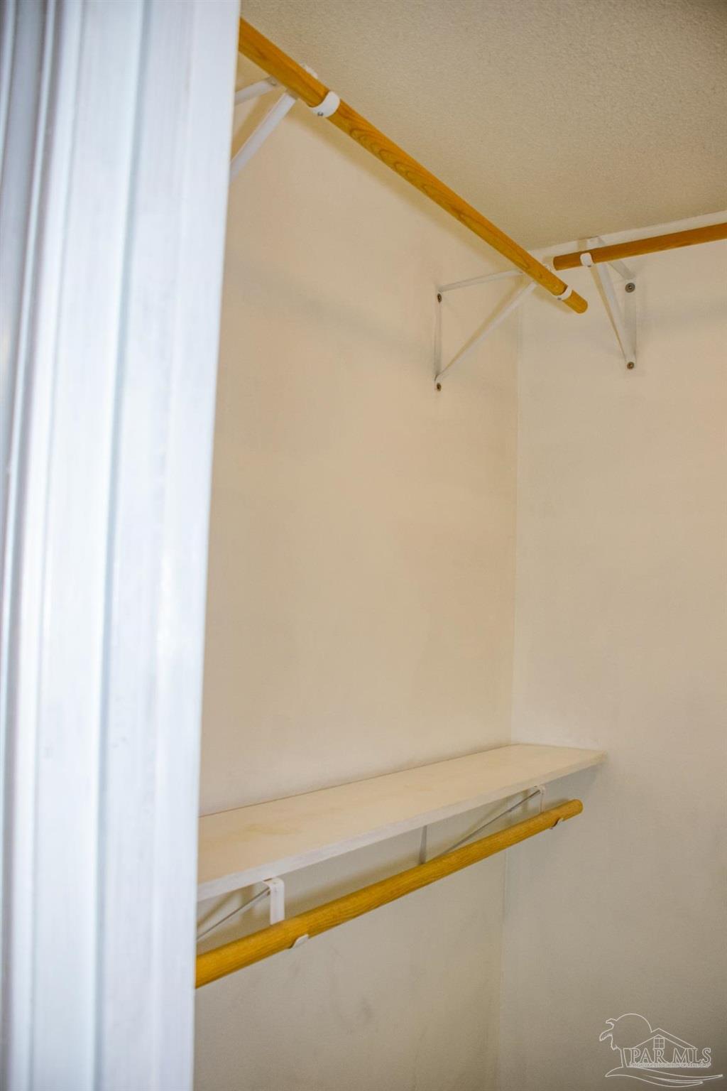 6514 Oakcrest Road Milton, FL 32570 - Photo 52 of 68 a bathroom with a bathtub and a shower