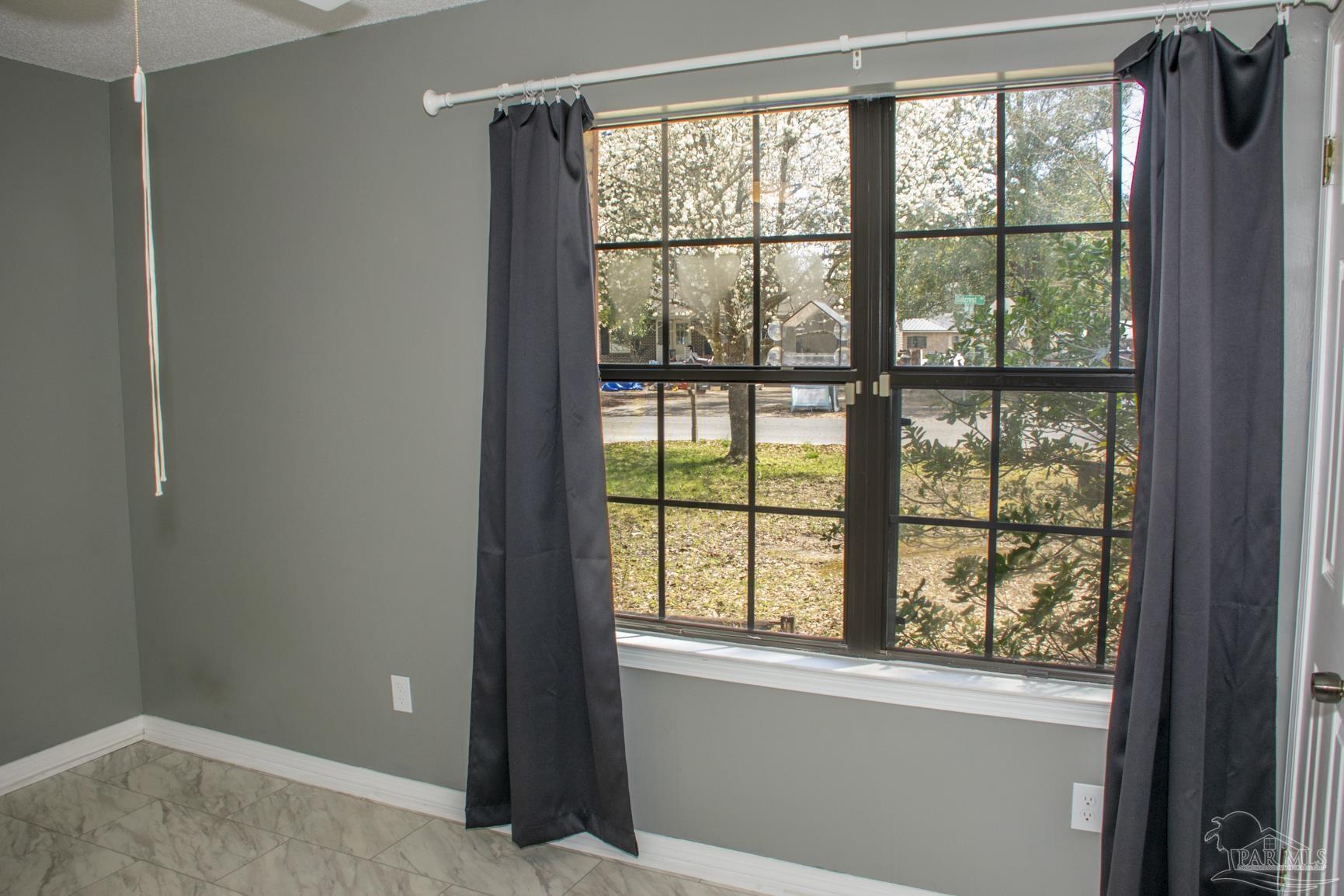 6514 Oakcrest Road Milton, FL 32570 - Photo 55 of 68 a view of a window in a room