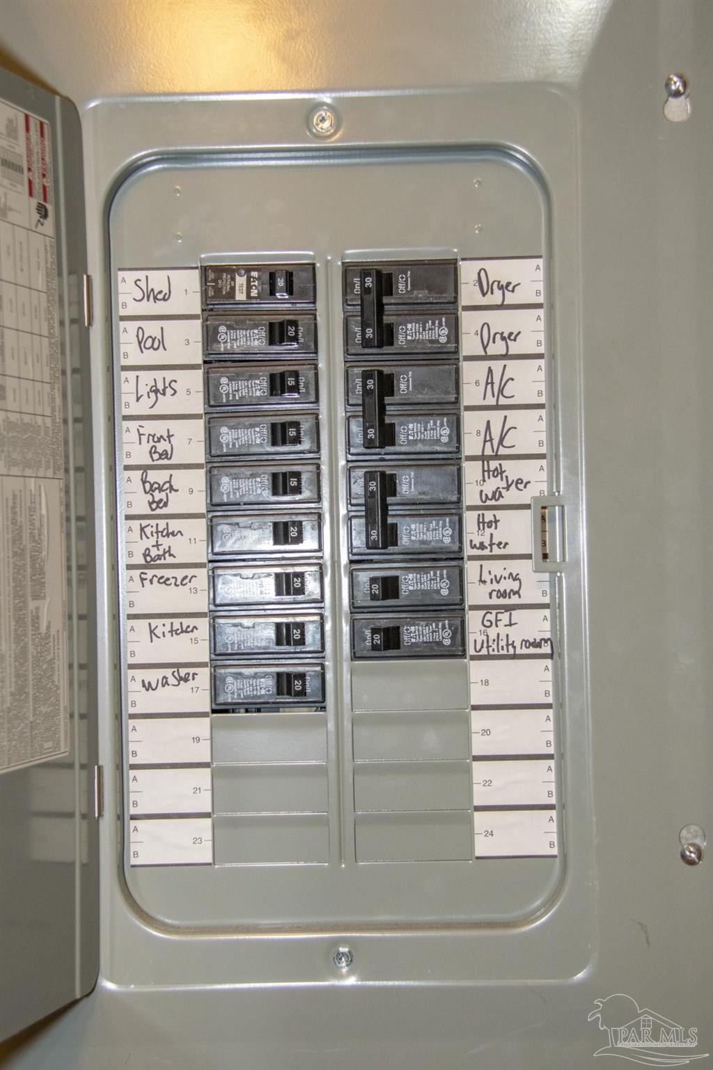 6514 Oakcrest Road Milton, FL 32570 - Photo 62 of 68 a view of walk in closet with empty racks